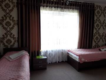 Фото номера Двухместный номер с 2 отдельными кроватями Гостевой дом Guest House Jekshen г. Imeni Karla Marksa 7