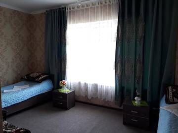 Фото номера Двухместный номер с 2 отдельными кроватями Гостевой дом Guest House Jekshen г. Imeni Karla Marksa 8