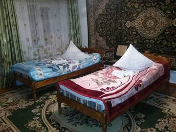 Фото номера Стандартный четырехместный номер Гостевой дом Guest House Jekshen г. Imeni Karla Marksa 2